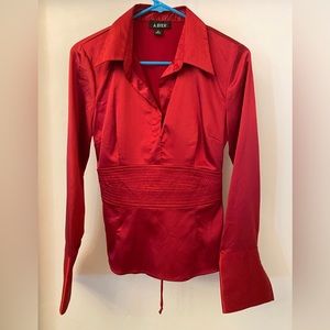 A. Byer red satin long sleeve top Junior size Med